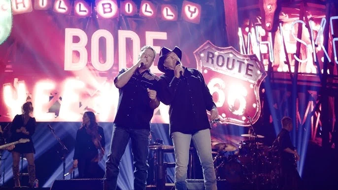 Two country singers performing a duet
